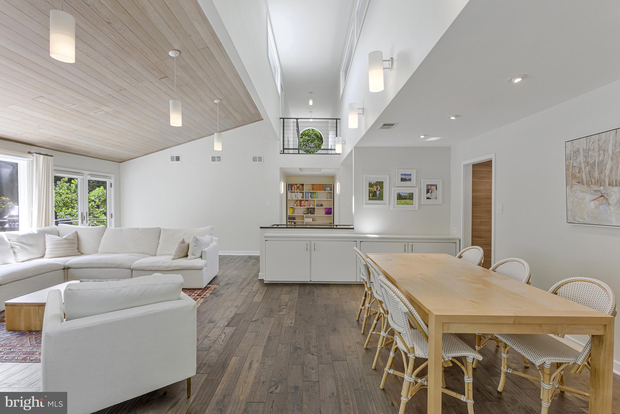 718 Springvale Road Great Falls, VA 22066 - Photo 9 of 57 a living room with furniture and a wooden floor