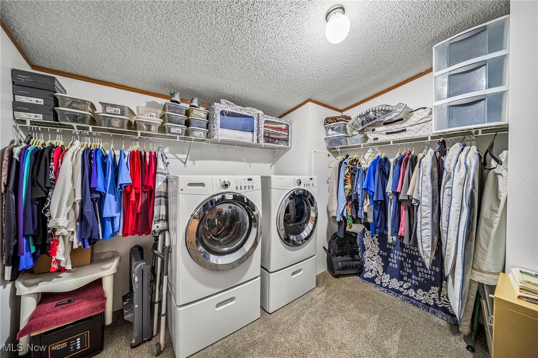 2891 Callender Road Rome, OH 44085 - Photo 18 of 41 Laundry inside Primary Walk-in Closet