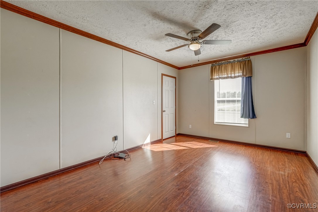 6779 South Hill Road Kenbridge, VA 23944 - Photo 24 of 50 Unfurnished room featuring a textured ceiling, cro