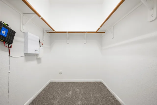 a view of an empty walk in closet