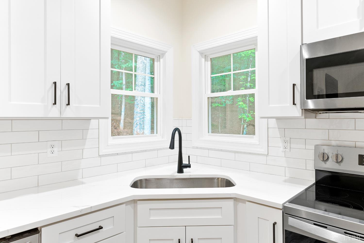 5610 Old Cifax Road Goode, VA 24556 - Photo 13 of 49 a kitchen with a sink and a window