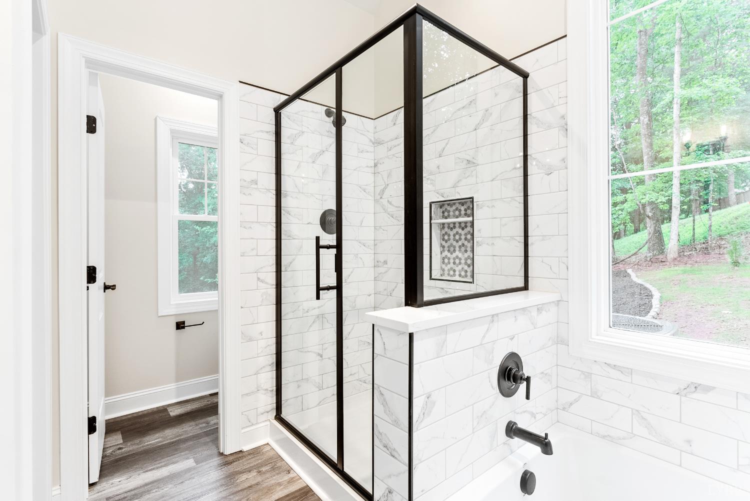 5610 Old Cifax Road Goode, VA 24556 - Photo 19 of 49 a bathroom with a shower and a window