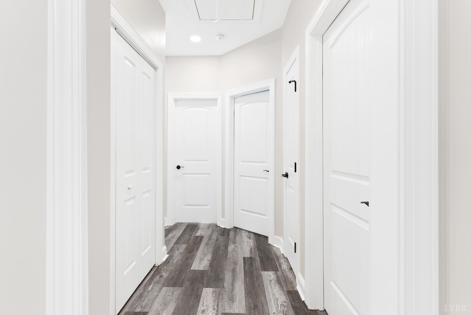 5610 Old Cifax Road Goode, VA 24556 - Photo 23 of 49 a view of a hallway with wooden floor and entryway