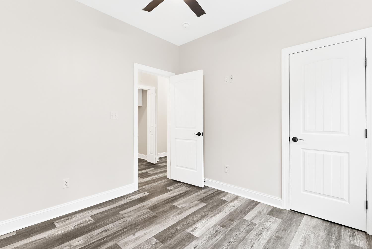 5610 Old Cifax Road Goode, VA 24556 - Photo 26 of 49 a view of a room with wooden floor and a hallway