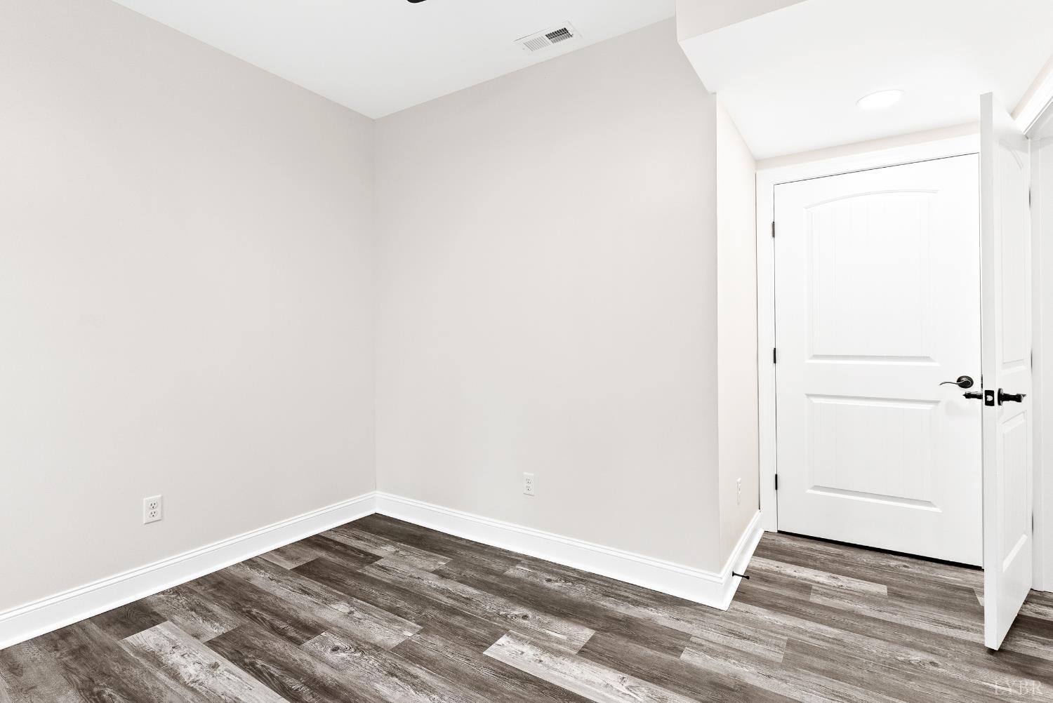 5610 Old Cifax Road Goode, VA 24556 - Photo 35 of 49 a view of a room with wooden floor