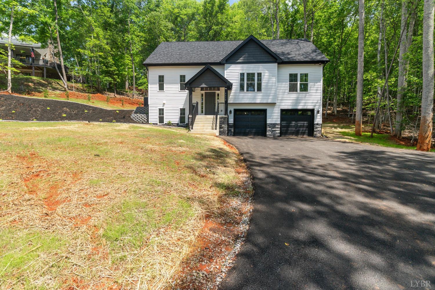 5610 Old Cifax Road Goode, VA 24556 - Photo 39 of 49 a front view of a house with a yard