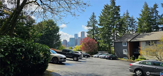 a view of a street with cars