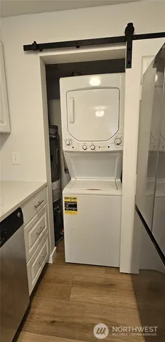 a utility room with washer and dryer