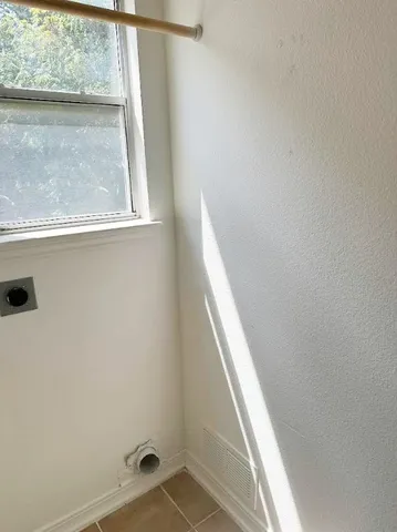 a view of a balcony with window