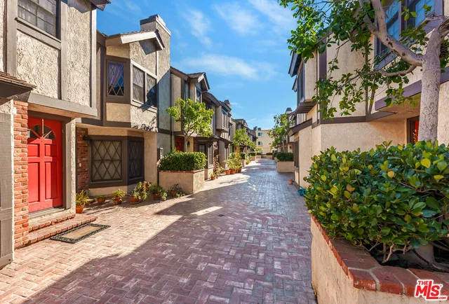 a street view with tall buildings