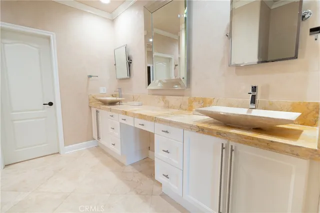 a bathroom with a sink toilet and vanity