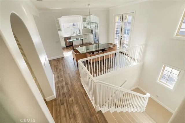 a kitchen with stainless steel appliances a sink and cabinets