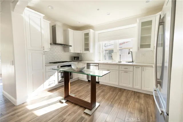 a living room with furniture and a mirror
