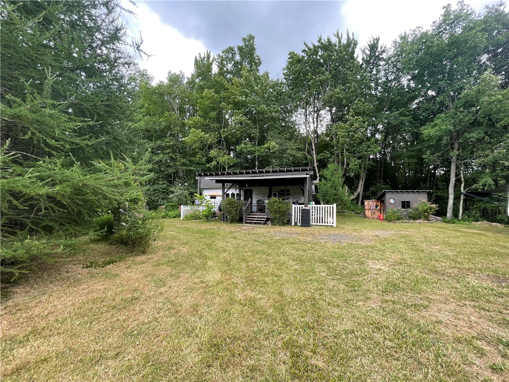 619 Town Line Road German, NY 13801 - Photo 19 of 38 Long shot of RV and outbuilding.
