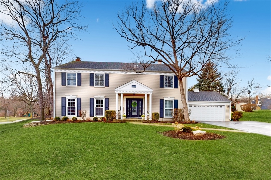 6 Knoll Ridge Road Rolling Meadows, IL 60008 - Photo 1 of 37 a view of a house with a swimming pool and a large tree