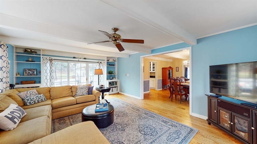 6 Knoll Ridge Road Rolling Meadows, IL 60008 - Photo 11 of 37 a living room with furniture and a flat screen tv