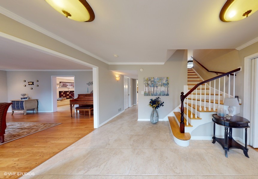 6 Knoll Ridge Road Rolling Meadows, IL 60008 - Photo 2 of 37 a view of a livingroom with furniture and staircase