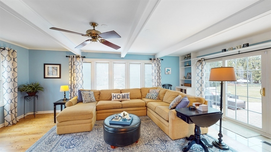 6 Knoll Ridge Road Rolling Meadows, IL 60008 - Photo 10 of 37 a living room with furniture and a large window