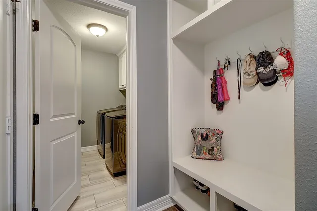a view of a hallway and closet