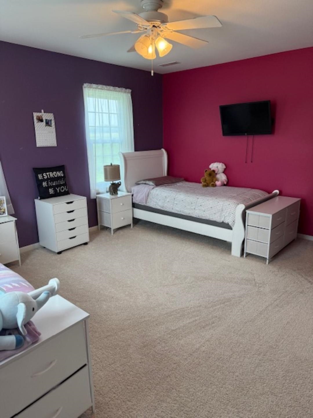 312 East Buckeye Road Dakota, IL 61018 - Photo 16 of 38 a bedroom with furniture and a chandelier