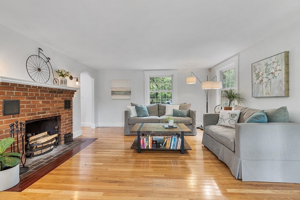 41 Gleasondale Road Stow, MA 01775 - Photo 14 of 42 a living room with furniture a fireplace and window