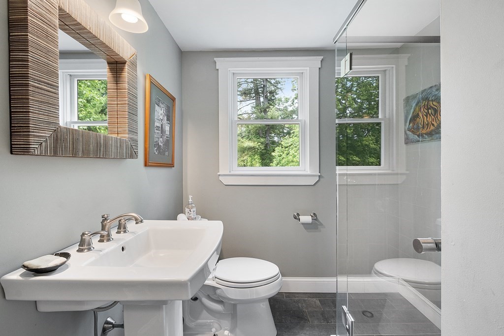 41 Gleasondale Road Stow, MA 01775 - Photo 15 of 42 a bathroom with a sink a toilet and a window
