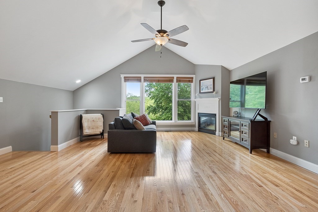 41 Gleasondale Road Stow, MA 01775 - Photo 25 of 42 a living room with furniture and a window