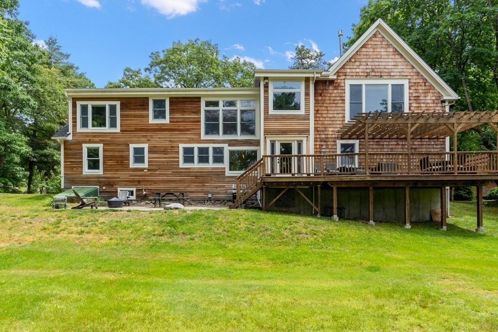 41 Gleasondale Road Stow, MA 01775 - Photo 6 of 42 a view of a house with a yard balcony