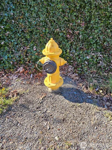 a view of balcony with wooden fence