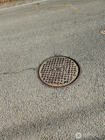 a bathroom with a toilet and a sink