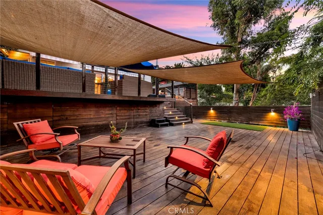 an outdoor sitting area with a couch