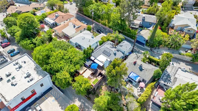 an aerial view of residential house with outdoor space
