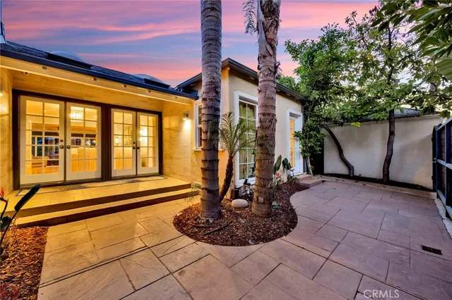 a view of a house with basketball court