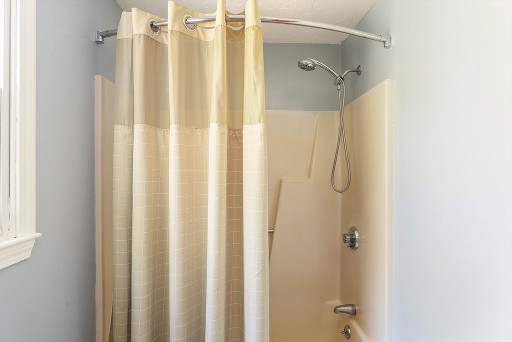 12 Loyola Circle Boston, MA 02132 - Photo 20 of 29 a bathroom with a shower and a sink