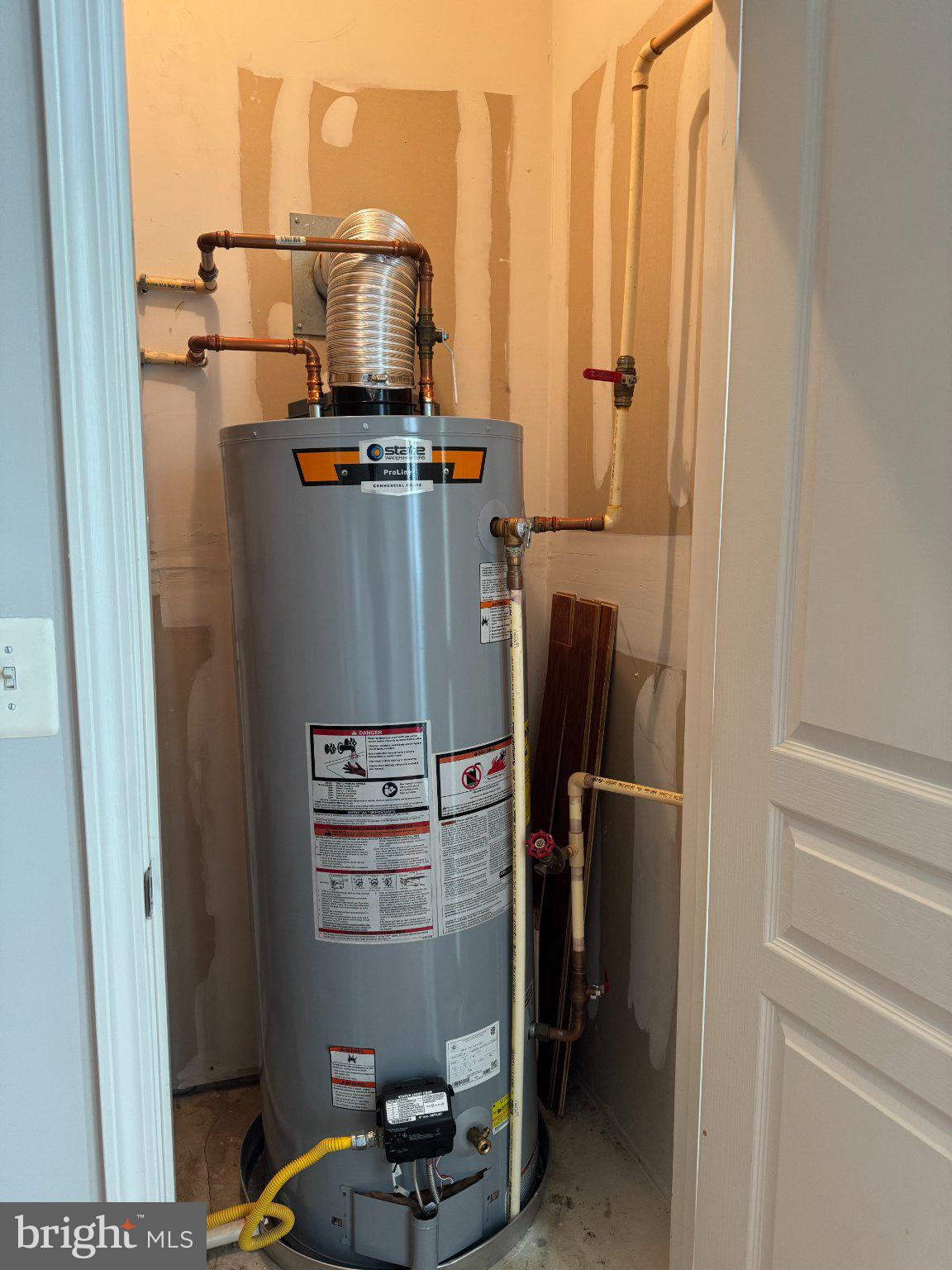 12000 Market Street, Unit 173 Reston, VA 20190 - Photo 19 of 47 Efficient water heater in utility space.