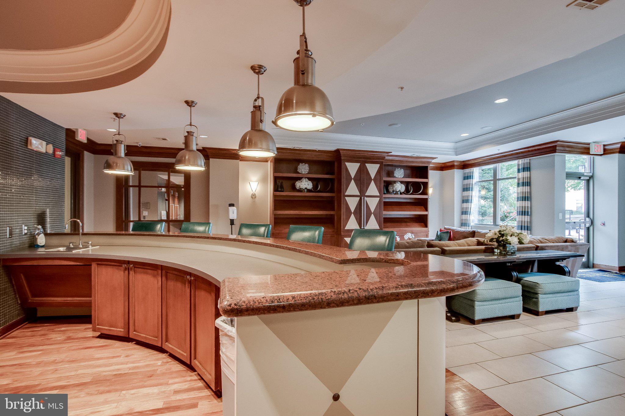 12000 Market Street, Unit 173 Reston, VA 20190 - Photo 20 of 47 Stylish communal space with modern flair.