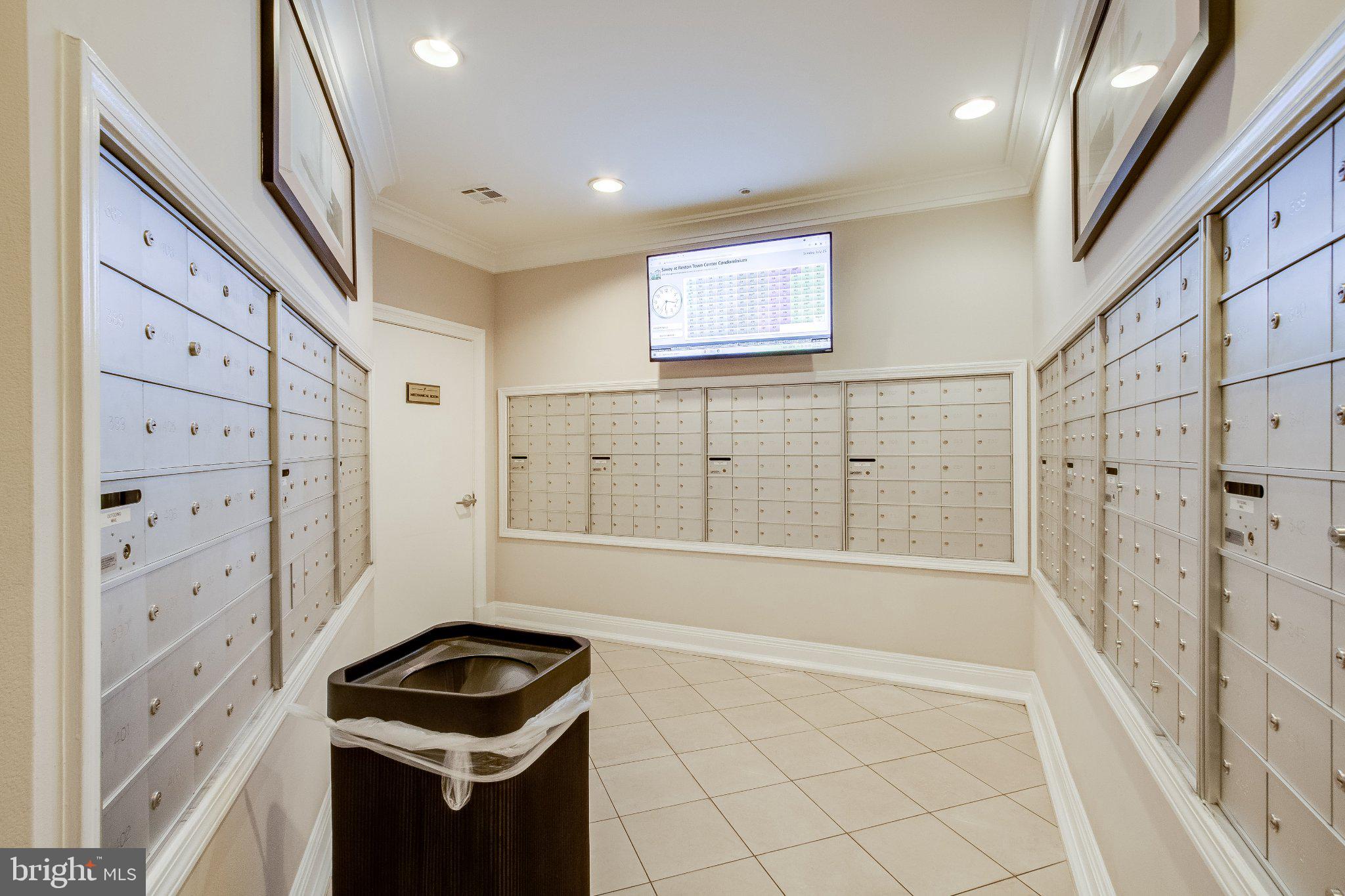 12000 Market Street, Unit 173 Reston, VA 20190 - Photo 21 of 47 Modern mailroom with secure boxes.