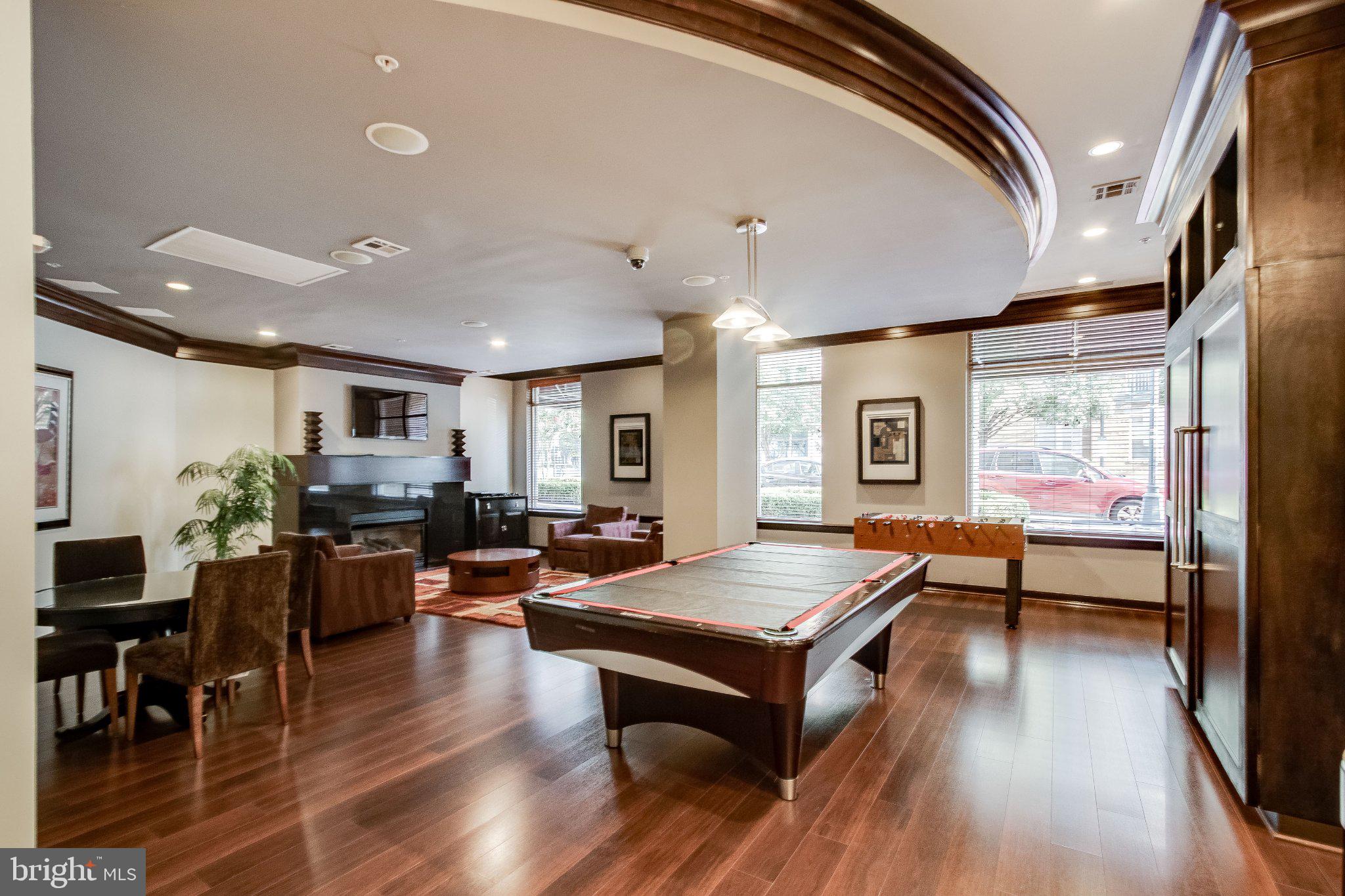 12000 Market Street, Unit 173 Reston, VA 20190 - Photo 30 of 47 Spacious game room with elegant design.