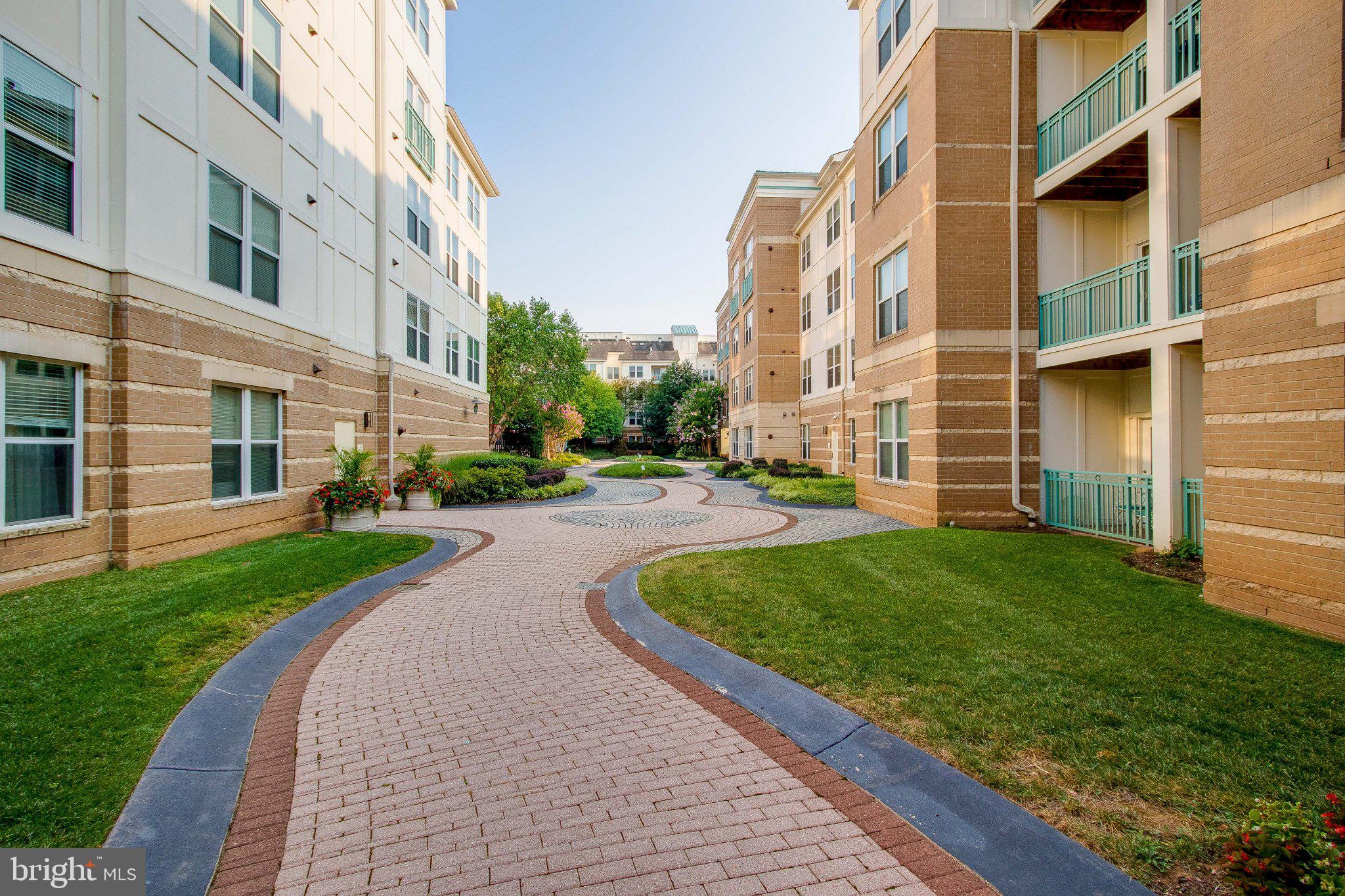 12000 Market Street, Unit 173 Reston, VA 20190 - Photo 43 of 47 Charming pathways in serene community.