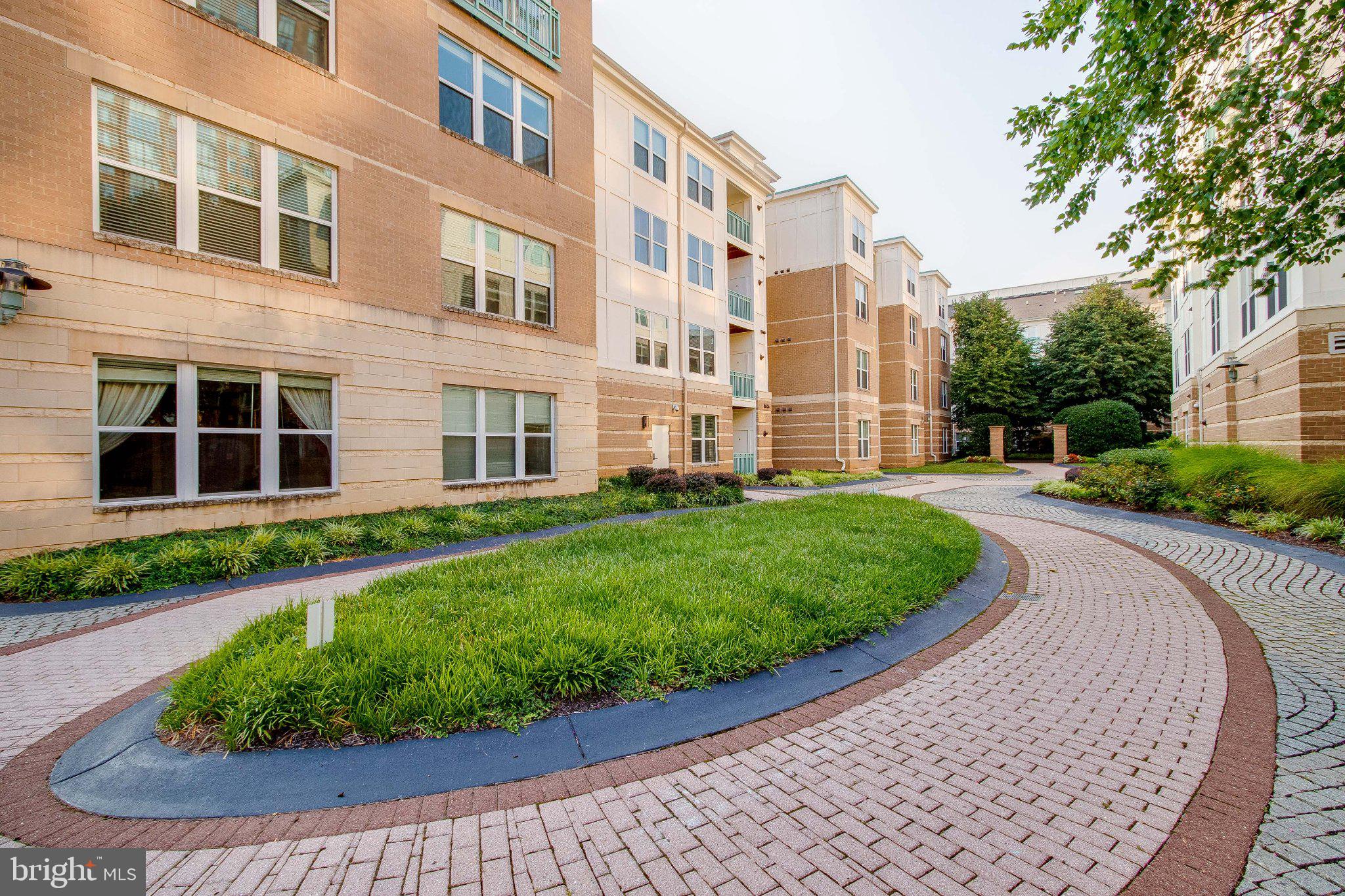12000 Market Street, Unit 173 Reston, VA 20190 - Photo 44 of 47 Charming courtyard with winding paths.