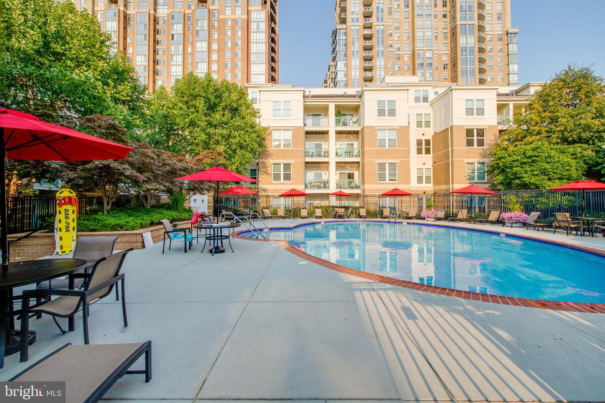 12000 Market Street, Unit 173 Reston, VA 20190 - Photo 45 of 47 Serene poolside retreat awaits you.