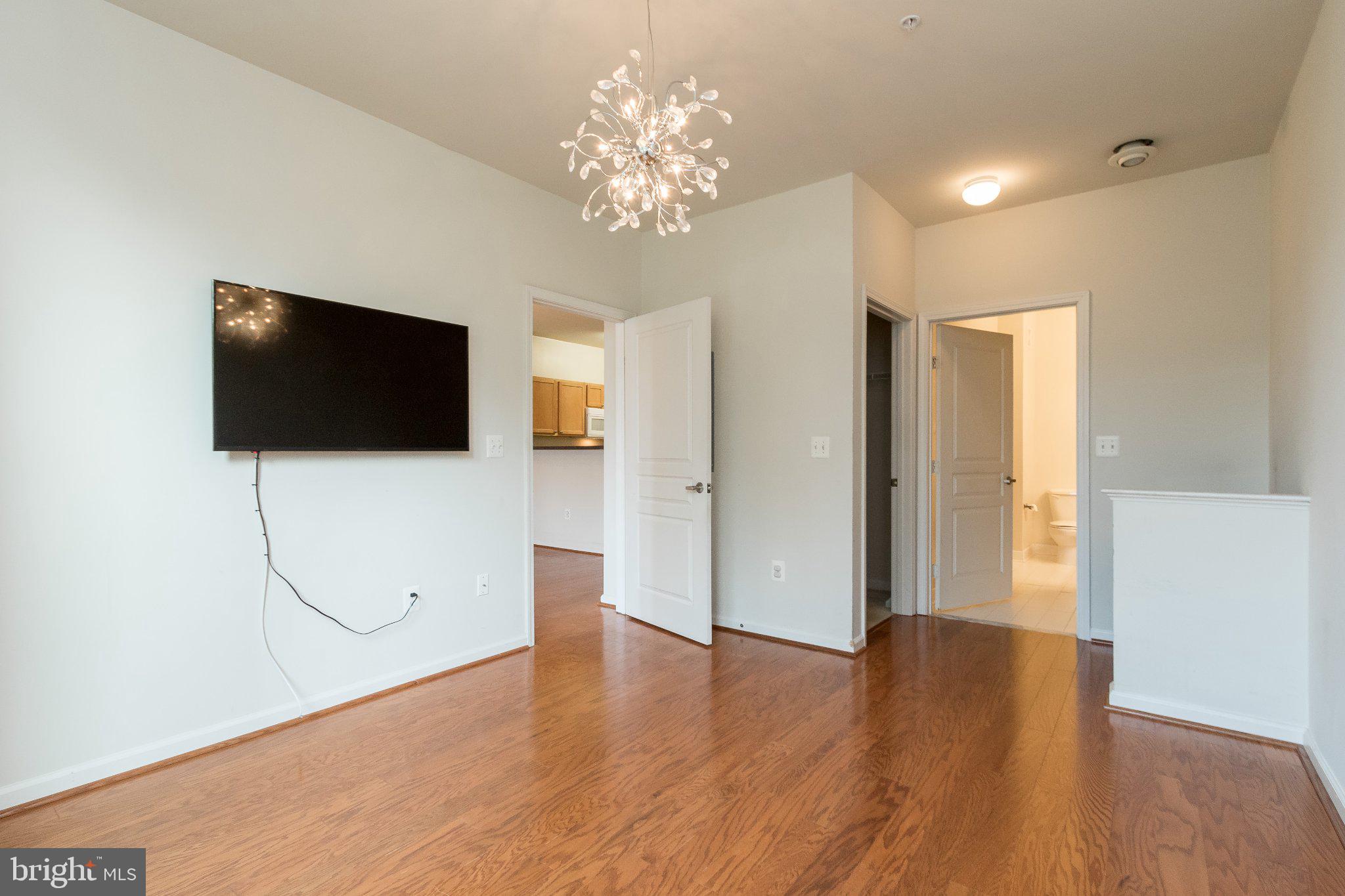 12000 Market Street, Unit 173 Reston, VA 20190 - Photo 7 of 47 Modern space with elegant lighting.