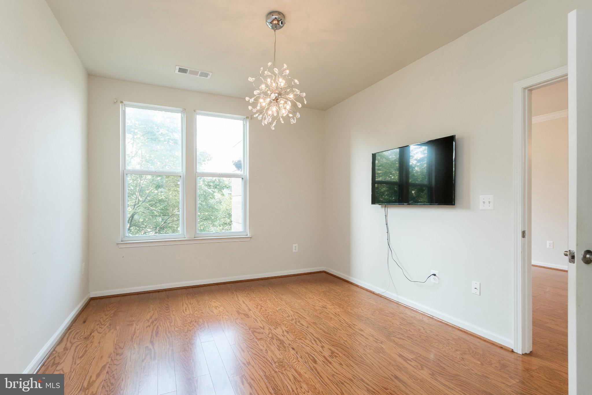 12000 Market Street, Unit 173 Reston, VA 20190 - Photo 8 of 47 Bright, airy room with modern charm.