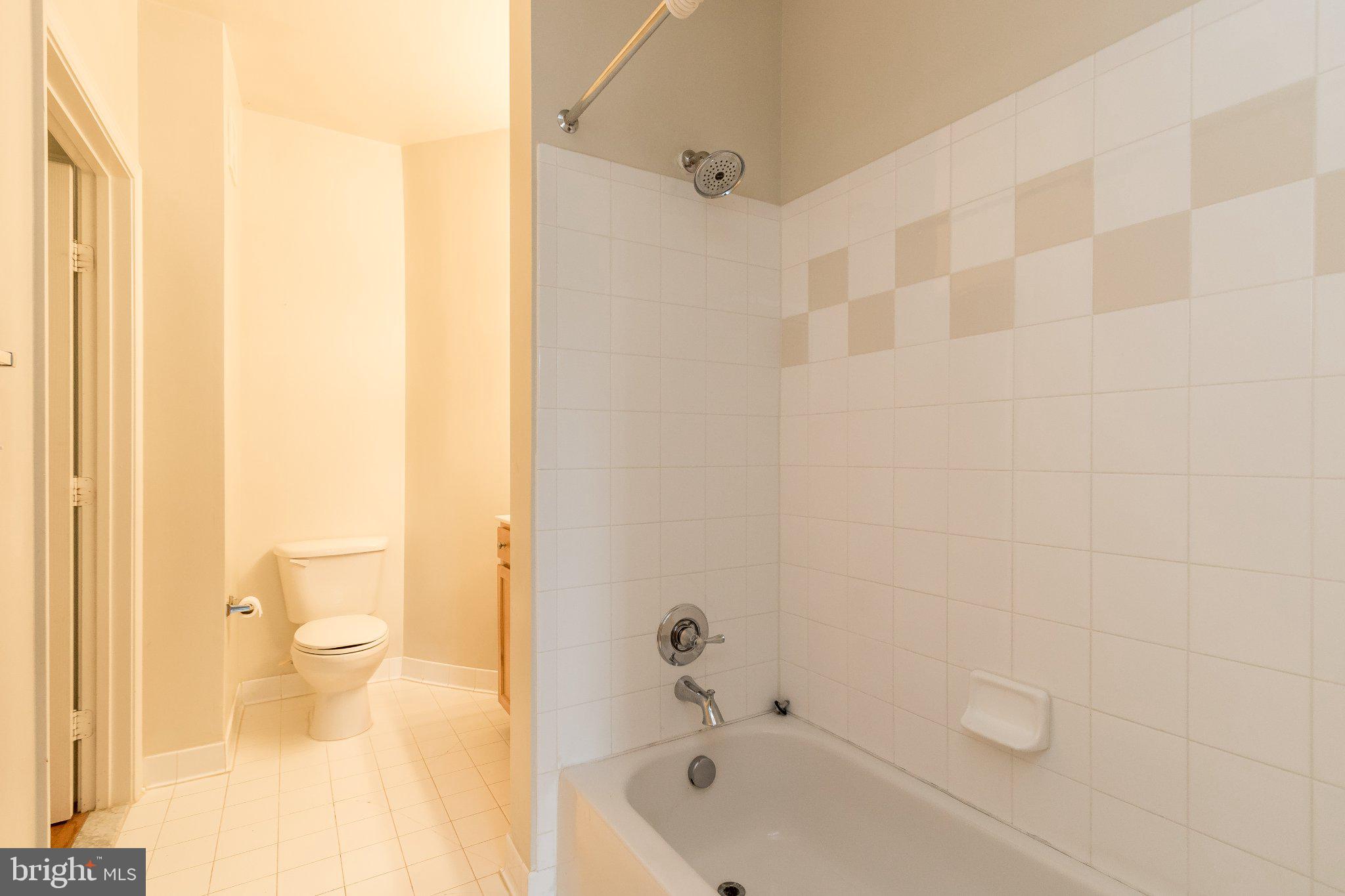 12000 Market Street, Unit 173 Reston, VA 20190 - Photo 9 of 47 Bright and inviting bathroom space.