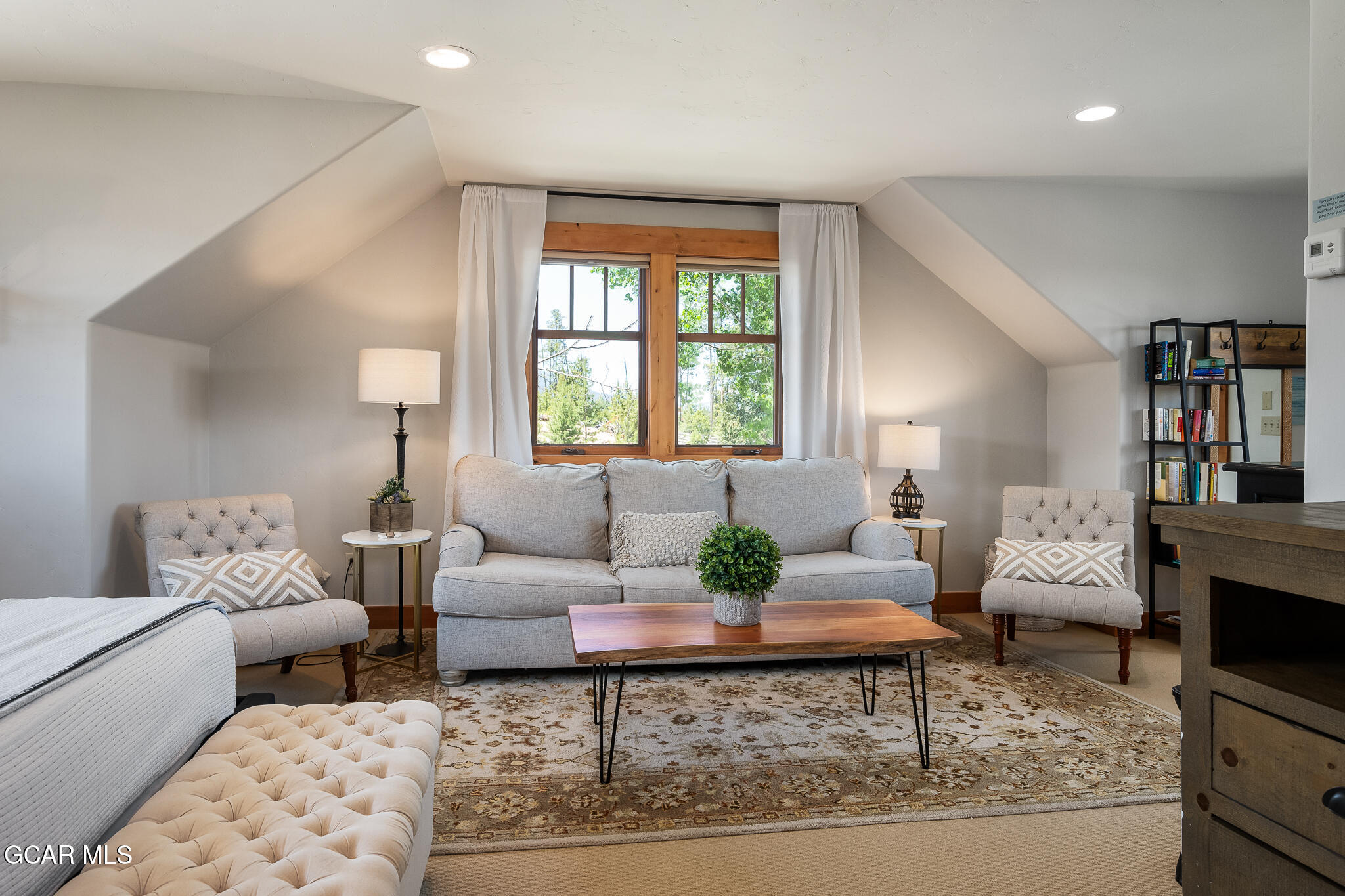4 Rifle Shot Trail Fraser, CO 80442 - Photo 26 of 47 a living room with furniture and a fireplace