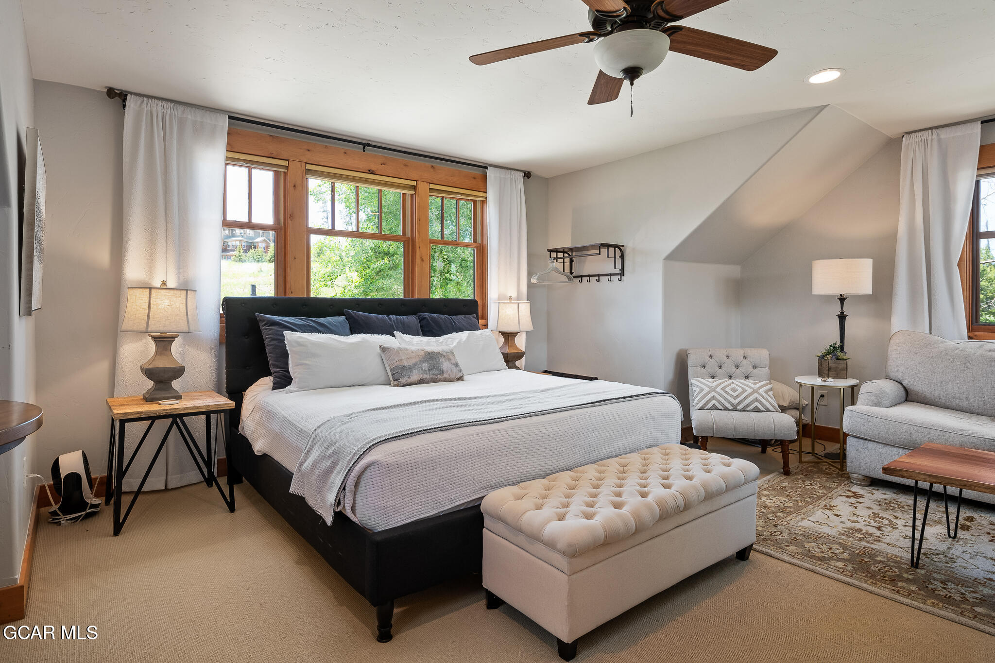 4 Rifle Shot Trail Fraser, CO 80442 - Photo 27 of 47 a bedroom with bed and a couch