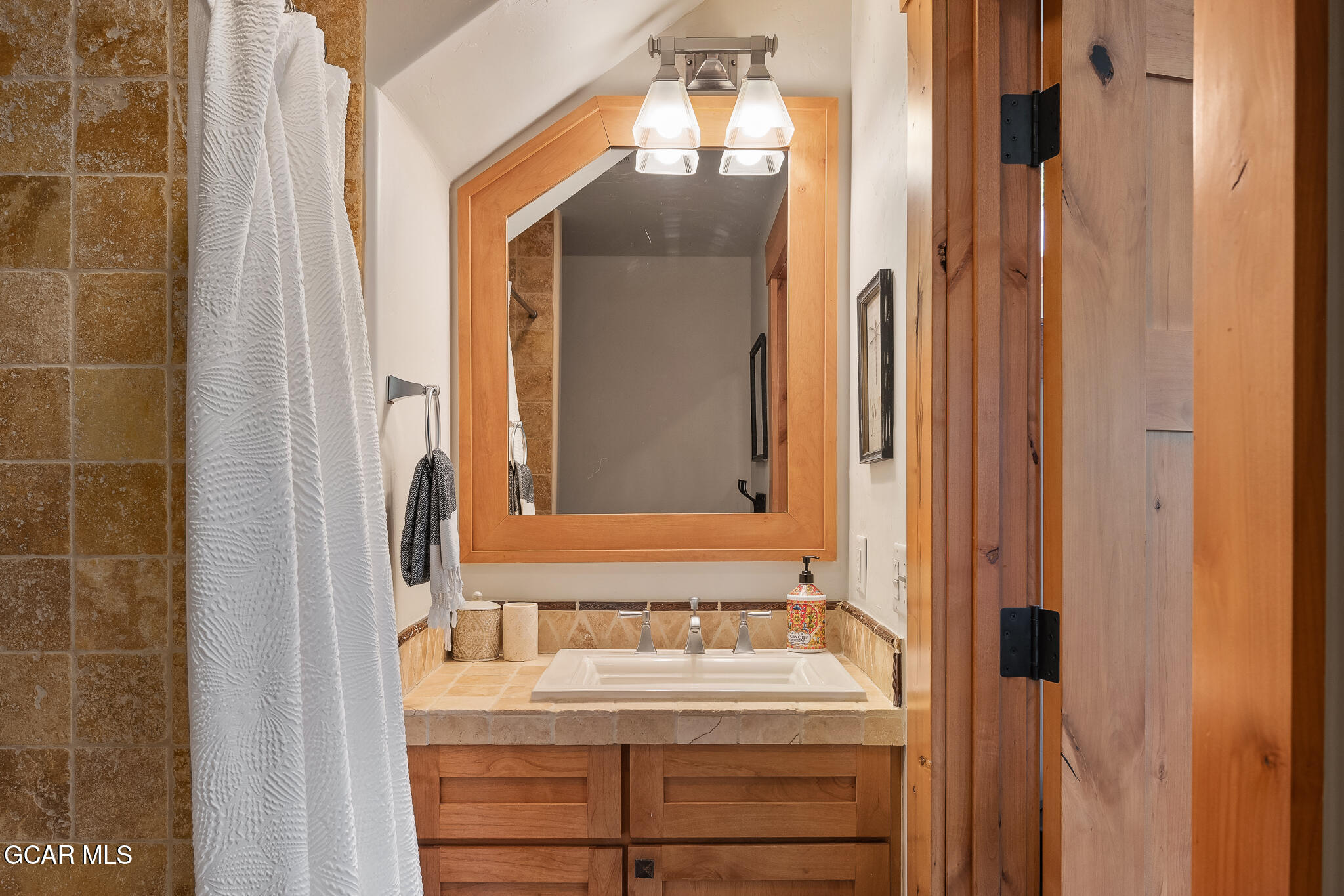 4 Rifle Shot Trail Fraser, CO 80442 - Photo 31 of 47 a bathroom with a sink and a mirror