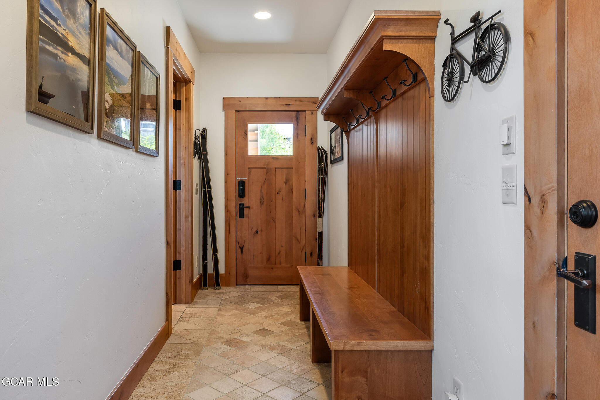 4 Rifle Shot Trail Fraser, CO 80442 - Photo 32 of 47 a view of a hallway with wooden floor and entryway