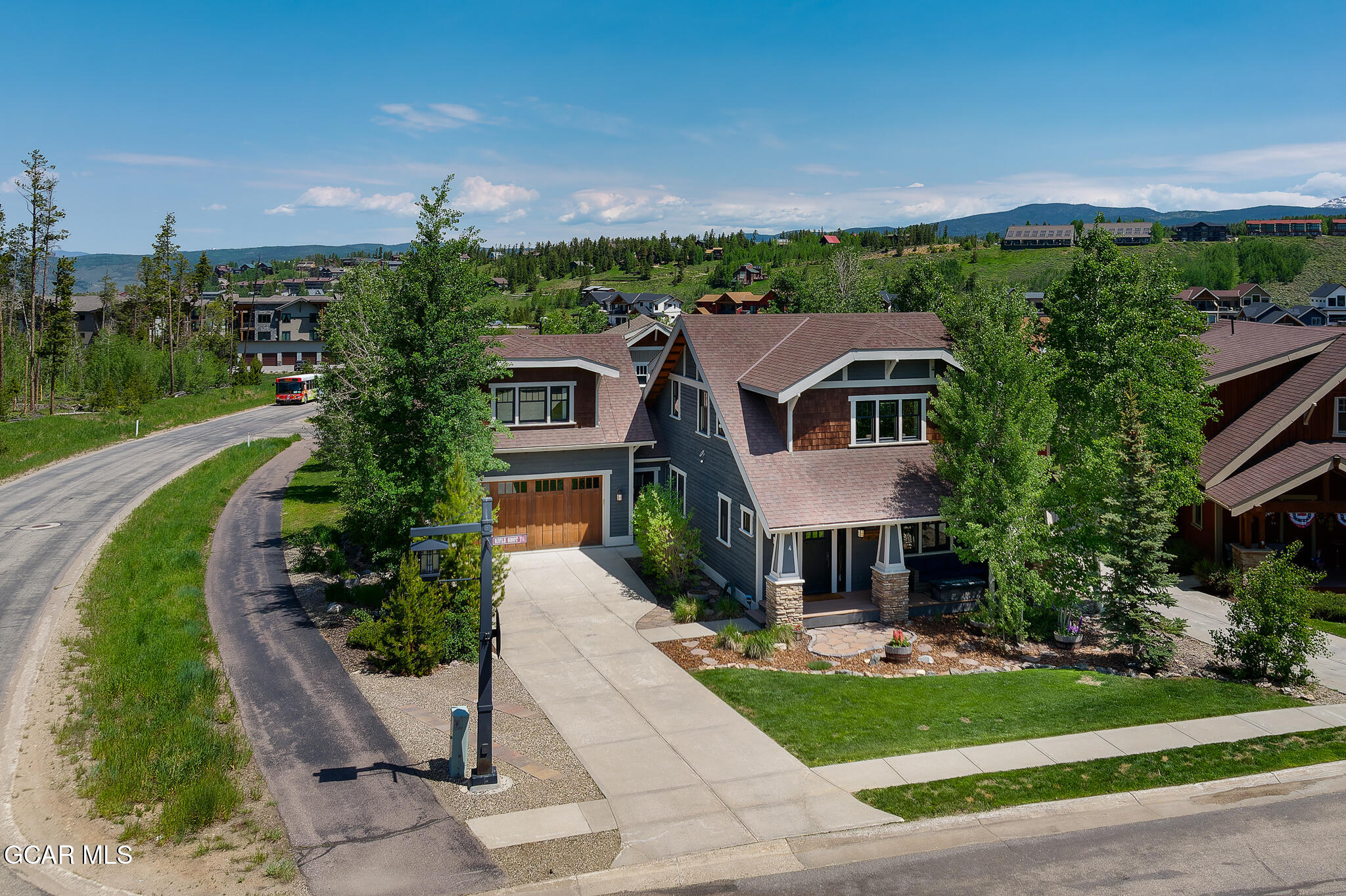 4 Rifle Shot Trail Fraser, CO 80442 - Photo 41 of 47 a front view of a house with a yard and trees