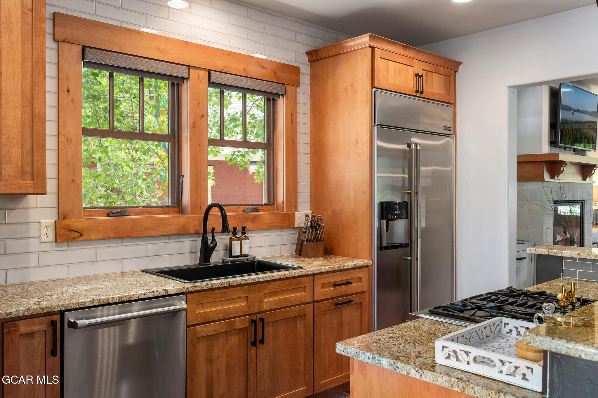 4 Rifle Shot Trail Fraser, CO 80442 - Photo 8 of 47 a kitchen with stainless steel appliances granite countertop a sink stove and refrigerator